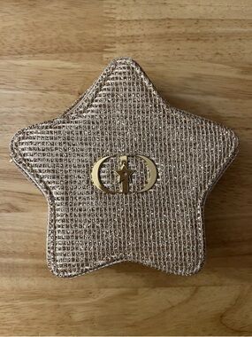 Dior gold star shaped pouch